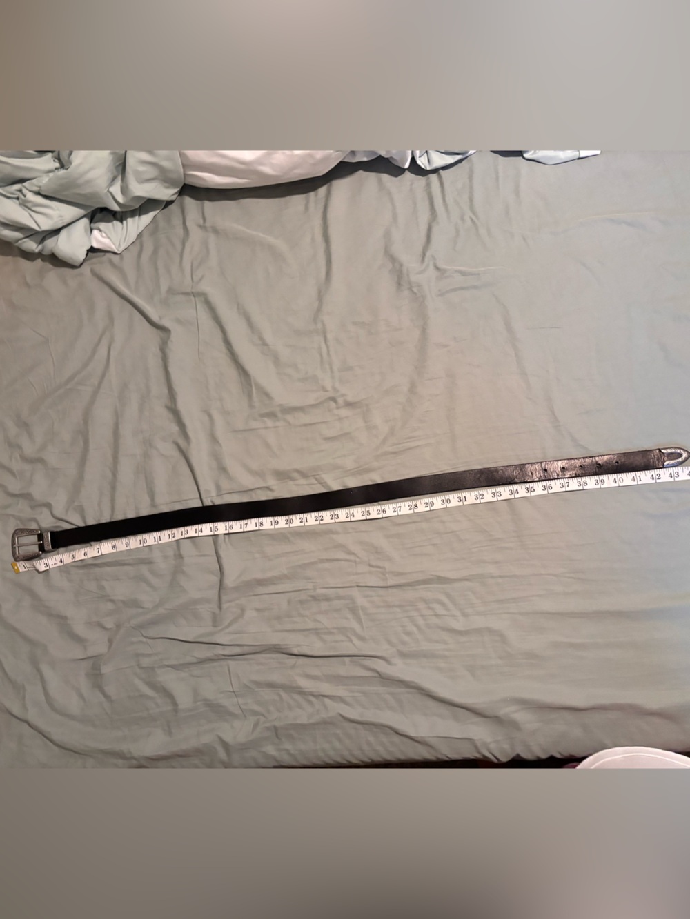 Western style belt with silver buckle